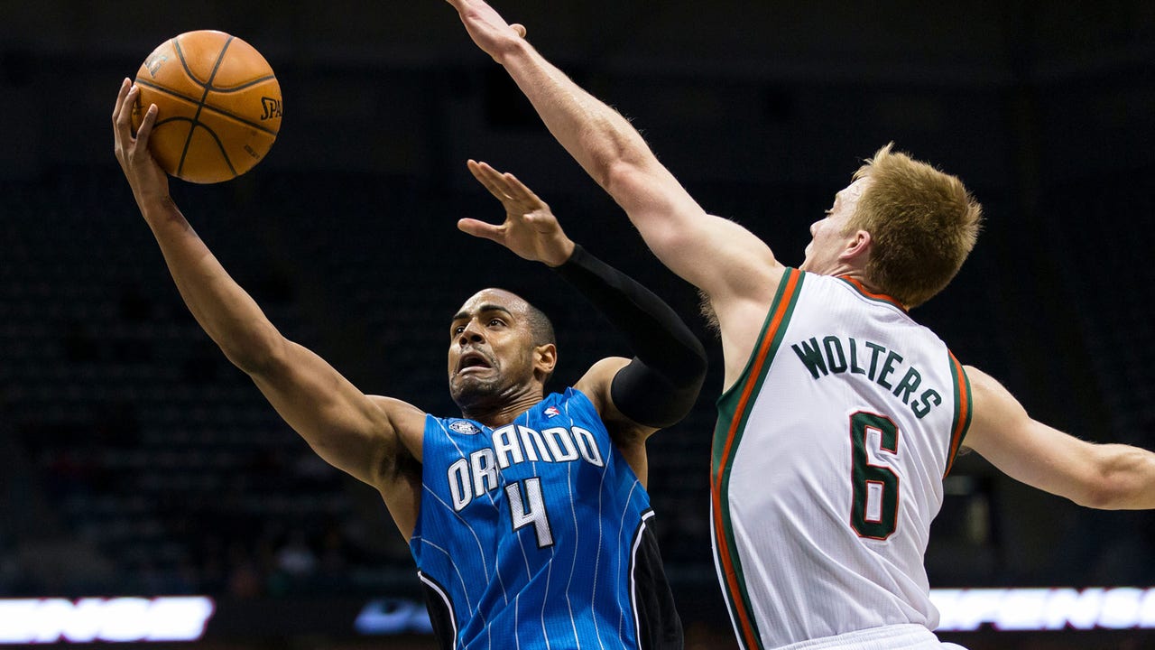 Knight scores 18 with sore foot, Bucks beat Magic